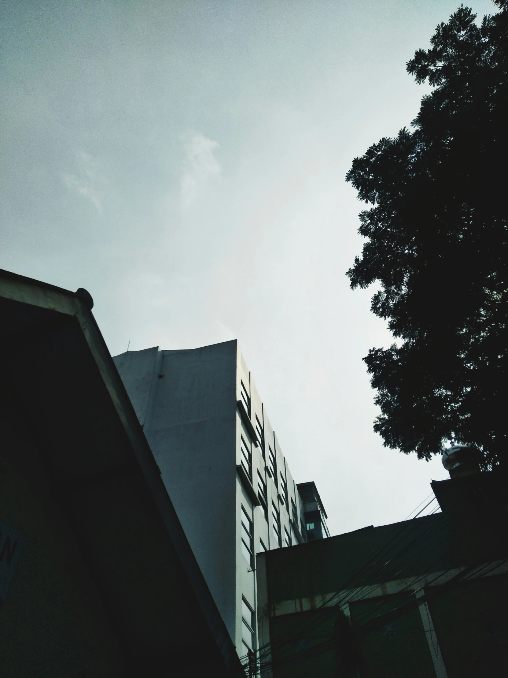 a building is shown with the sky in the background