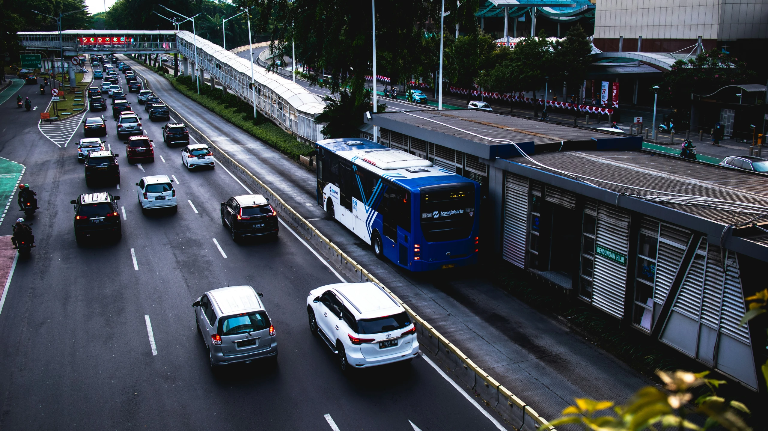 a street filled with traffic and traffic lights