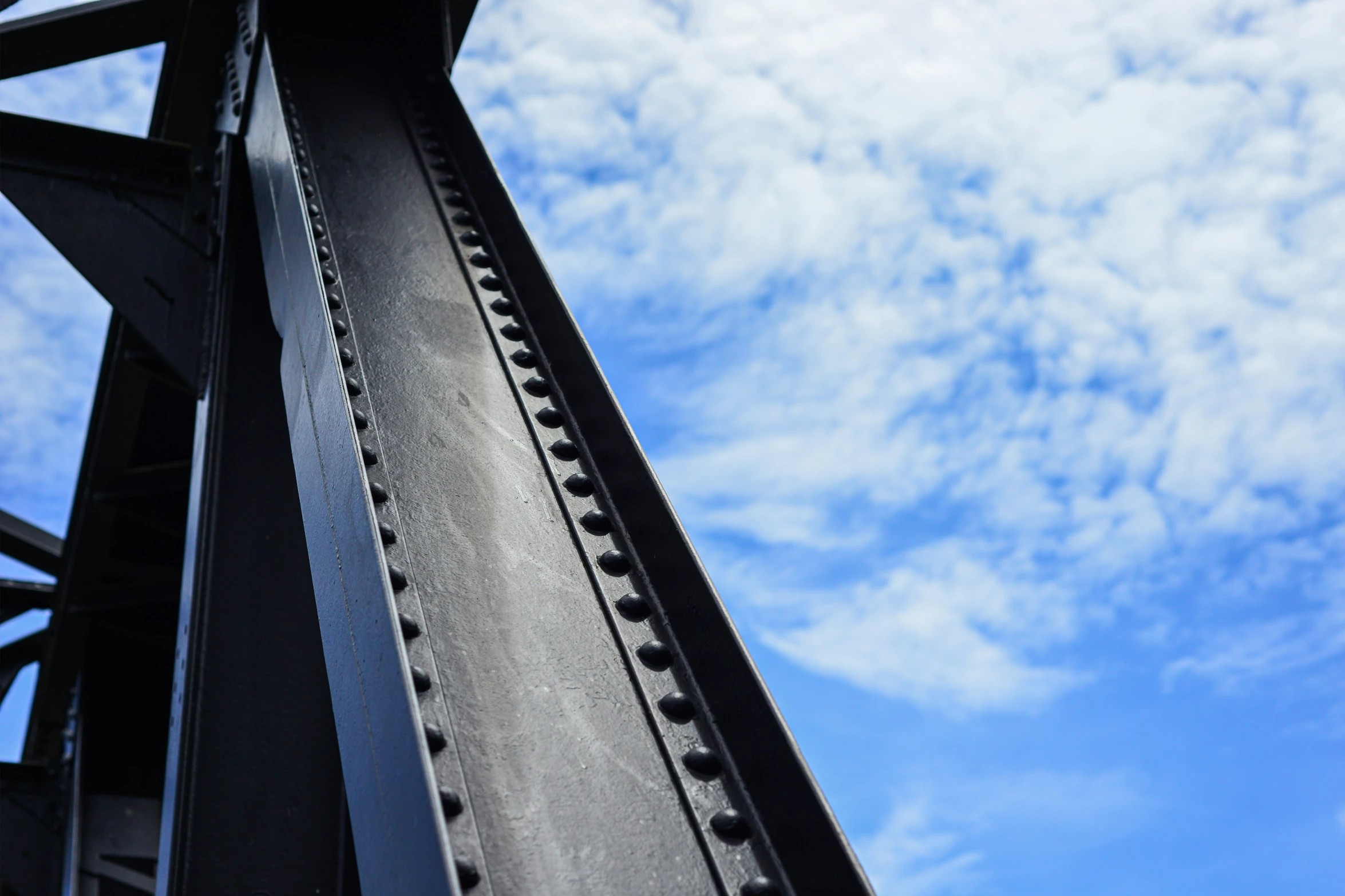 a traffic signal on top of a bridge