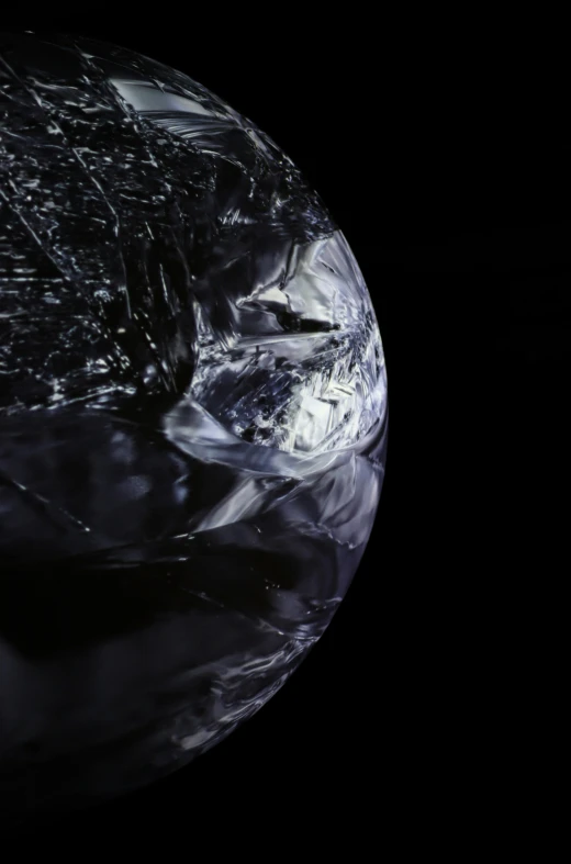 the inside of a piece of glass on a black background