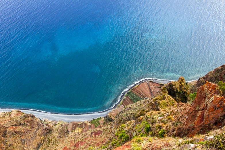 an aerial view of the beach in front of the ocean