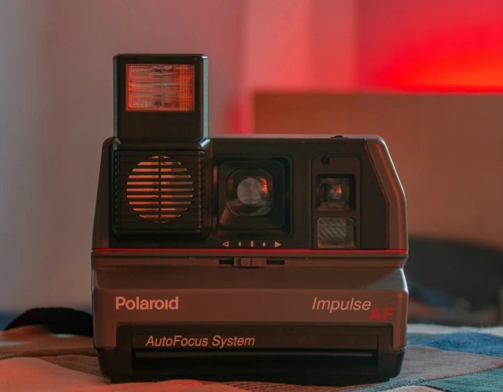 a camera with an image on the front is on display