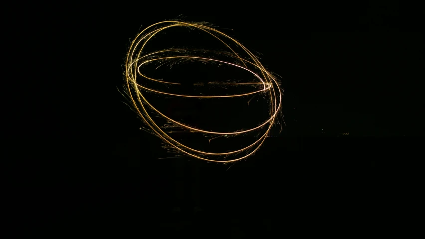 a spinning object at night with a long exposure