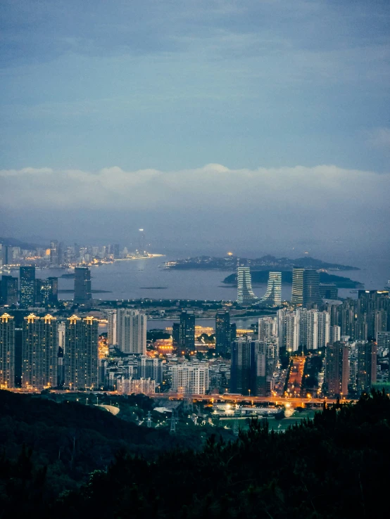 a large city at night with some light from buildings