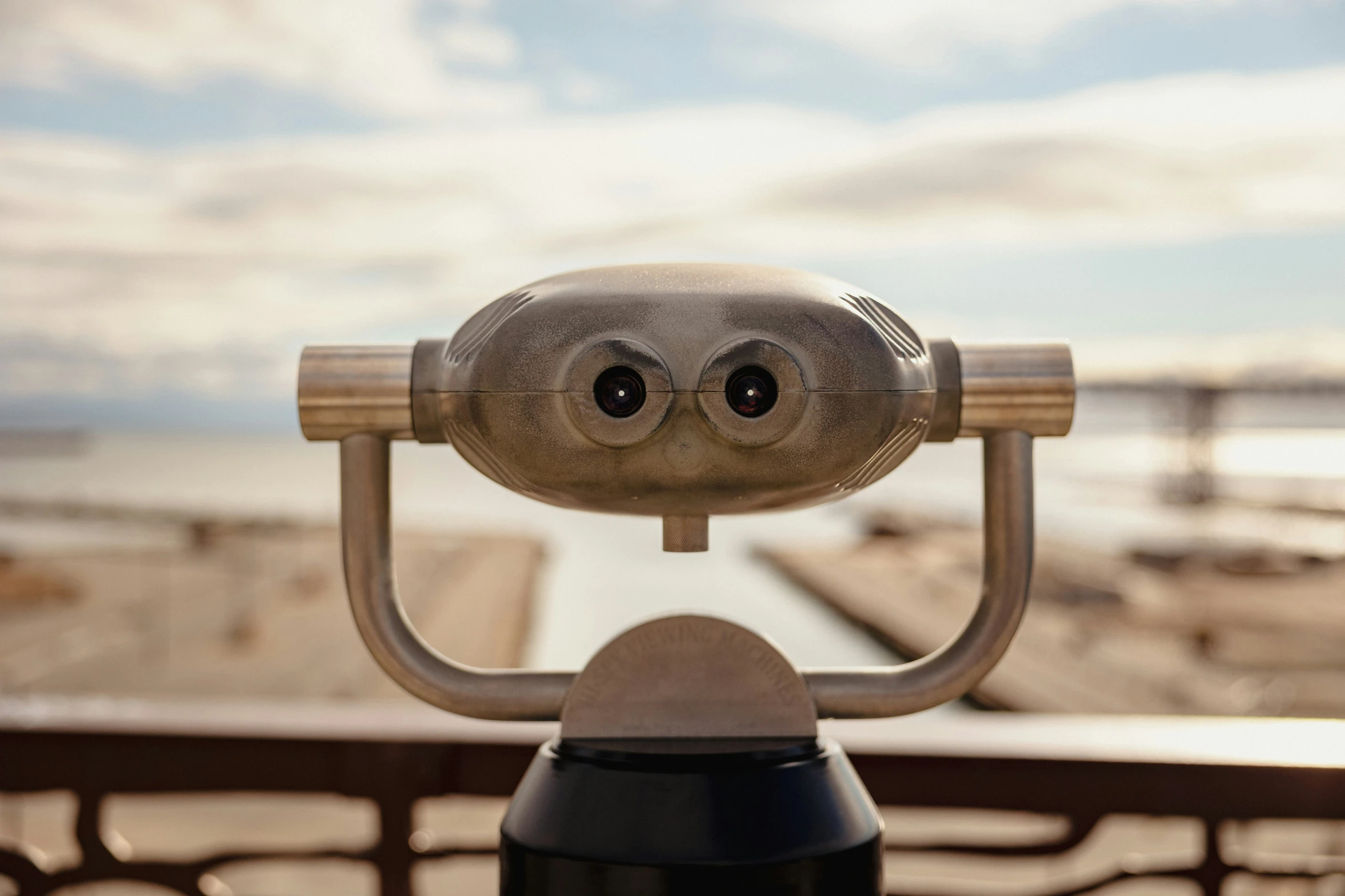 the front of a little binoculars looks at a beach