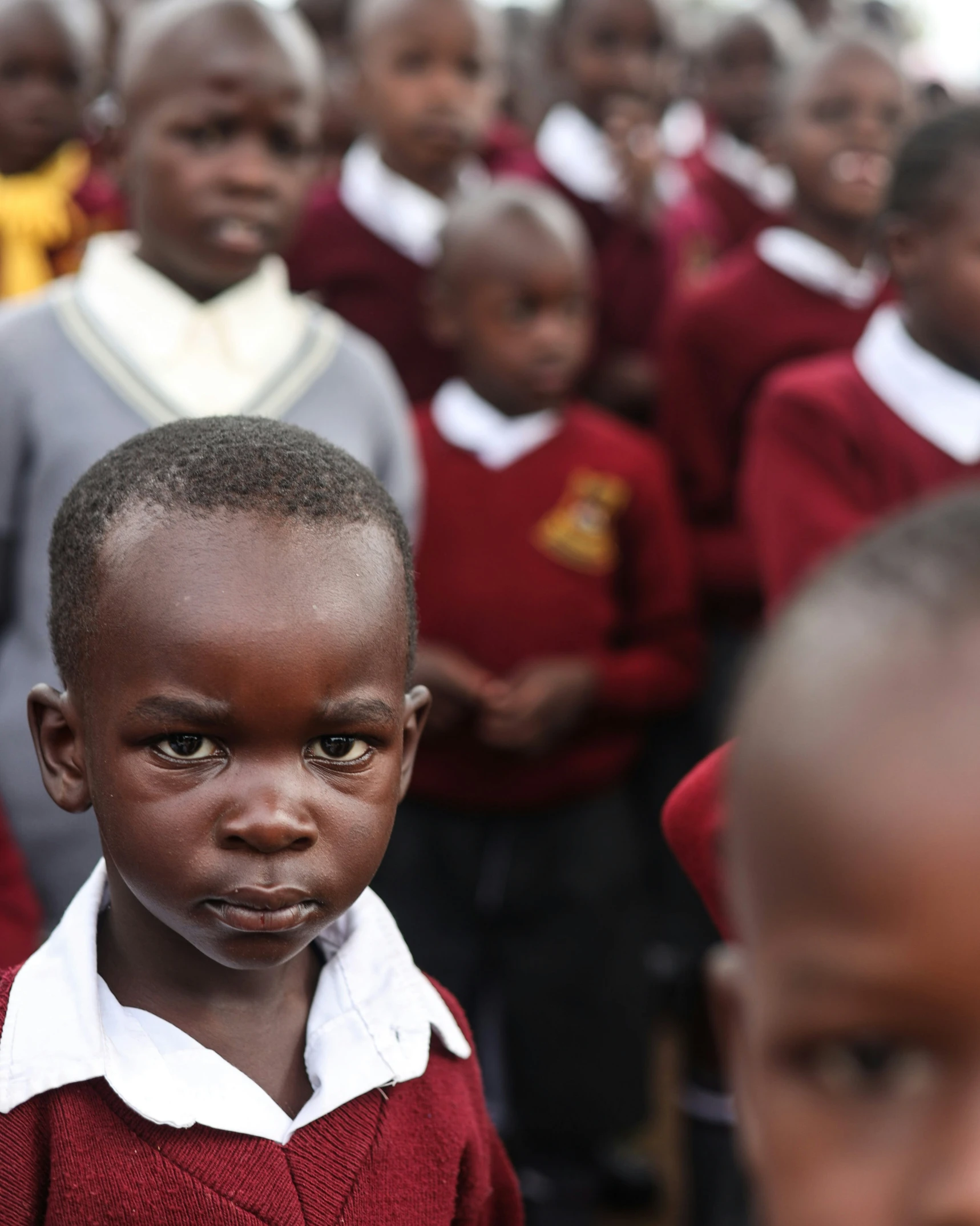 group of children standing together at a school