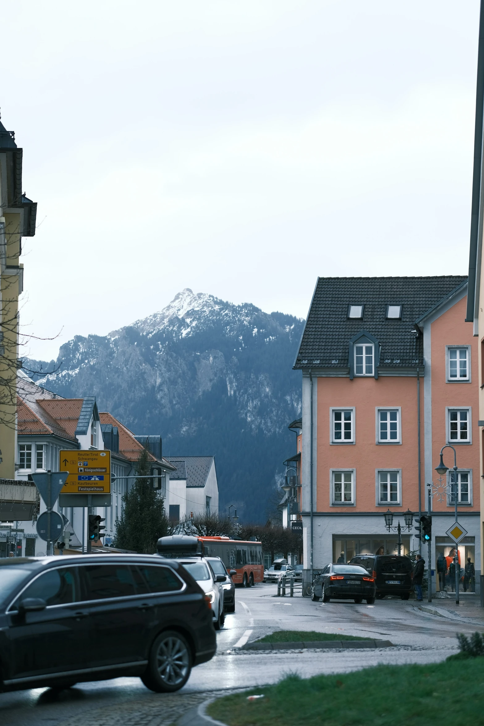 a view of an urban city with buildings and cars