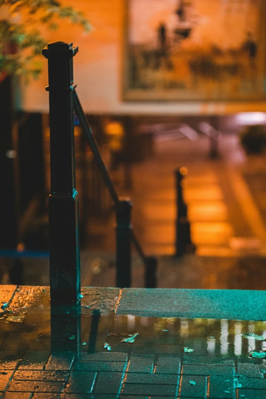 a glass umbrella sitting on top of a table