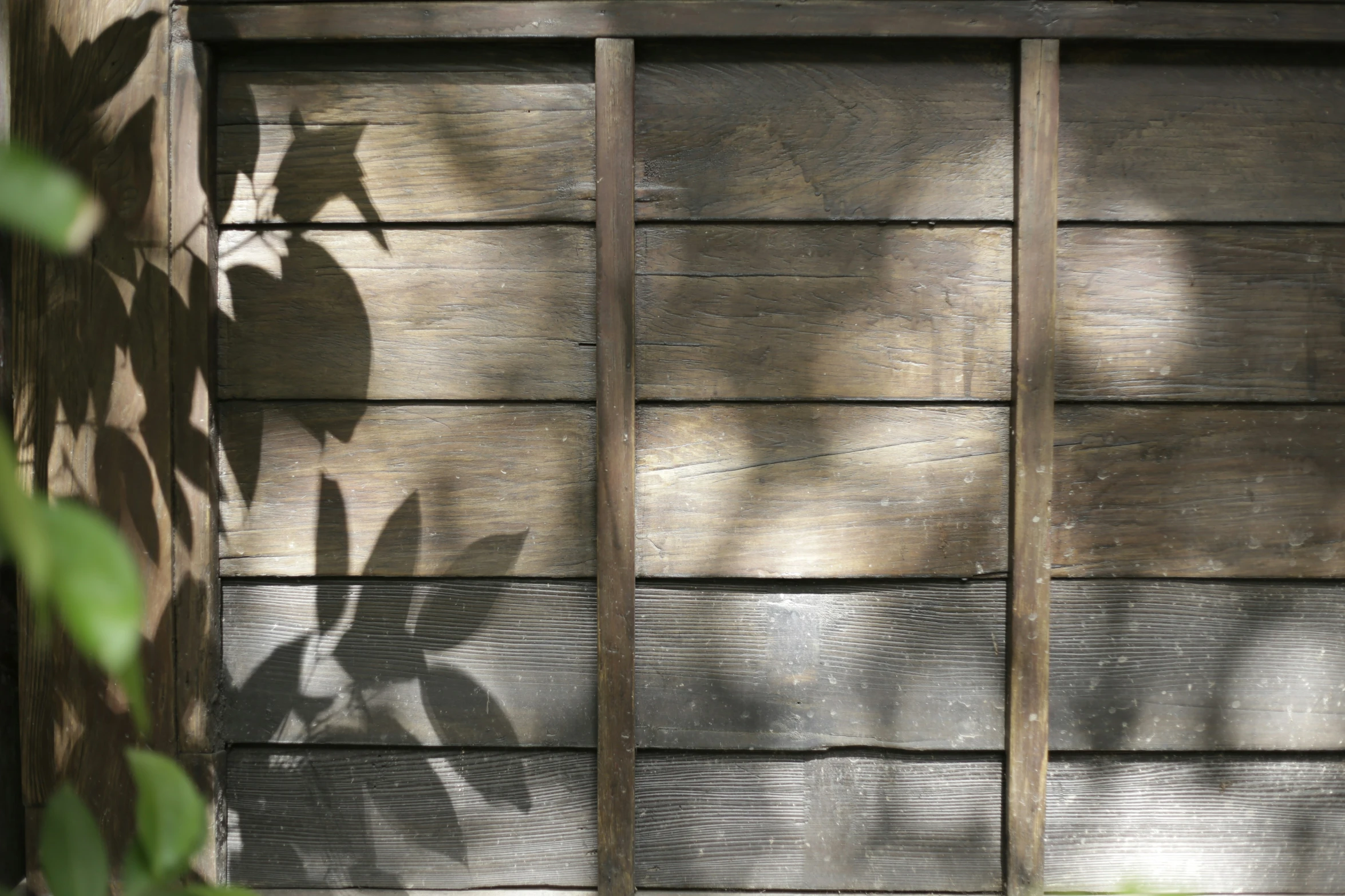 a wooden fence that has been made into a building