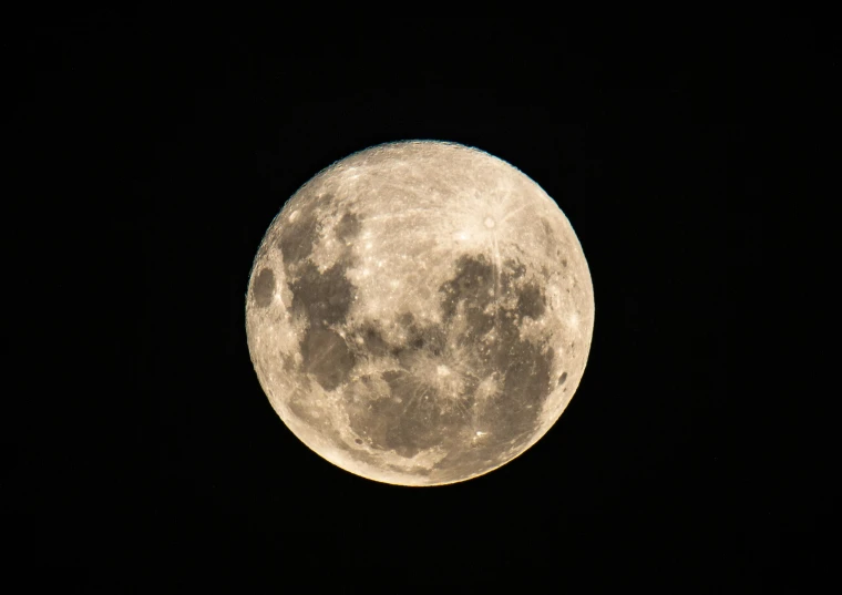 the moon is shining brightly over the horizon