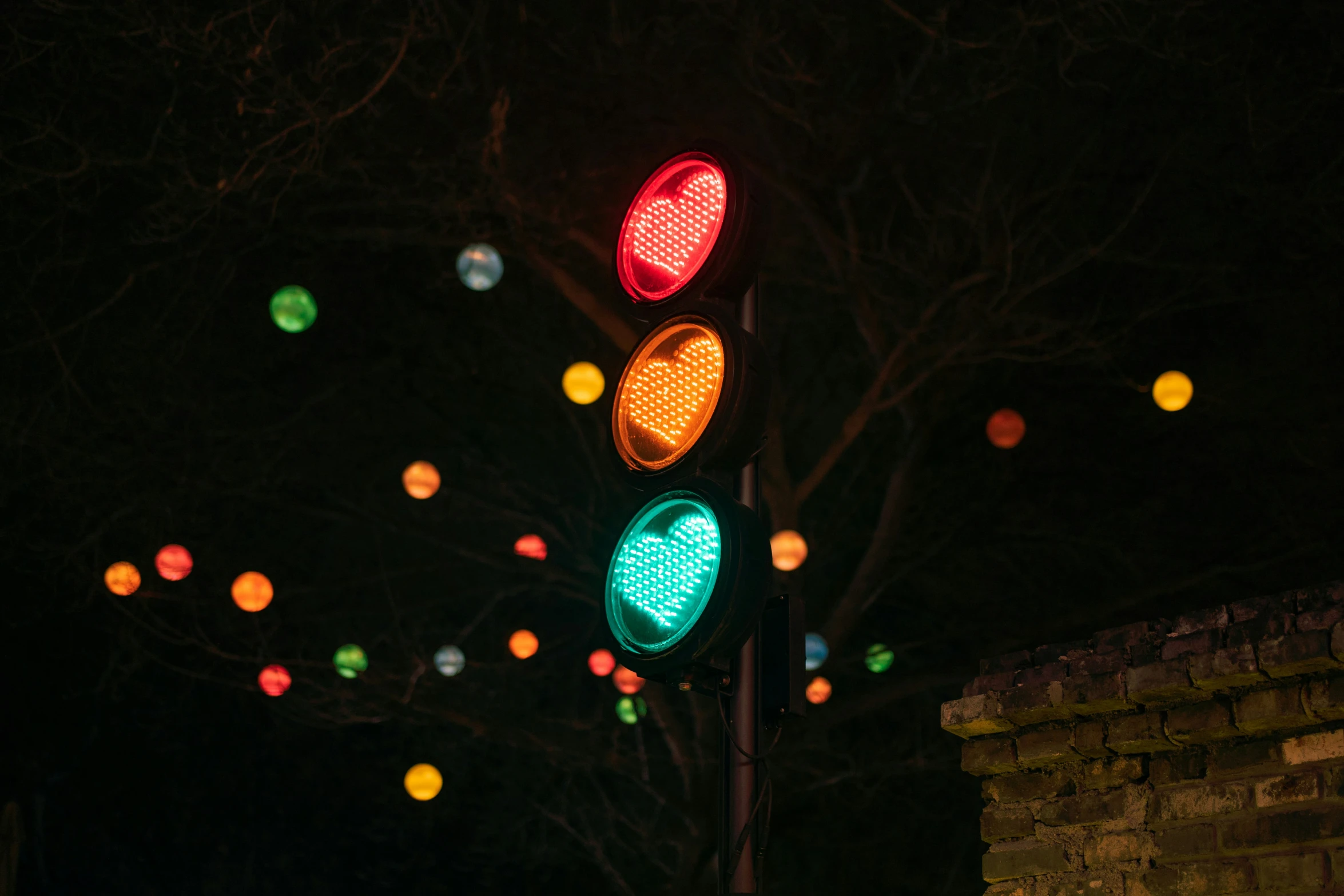 a couple of red and green traffic lights