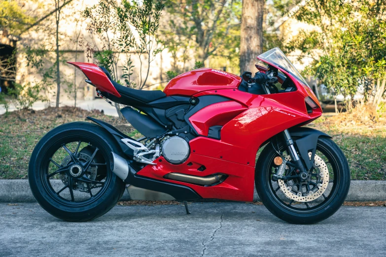 this is the picture of a red motorcycle in a street