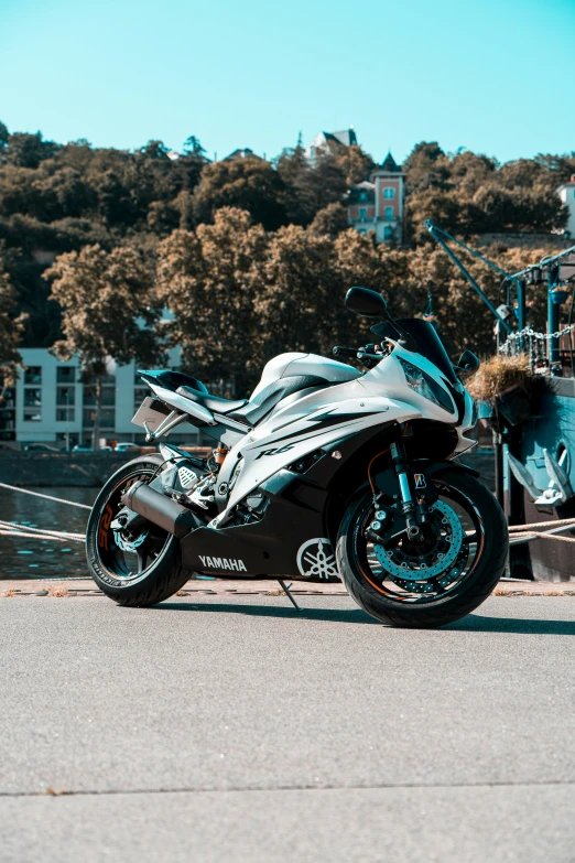 a motorcycle is parked on the road outside