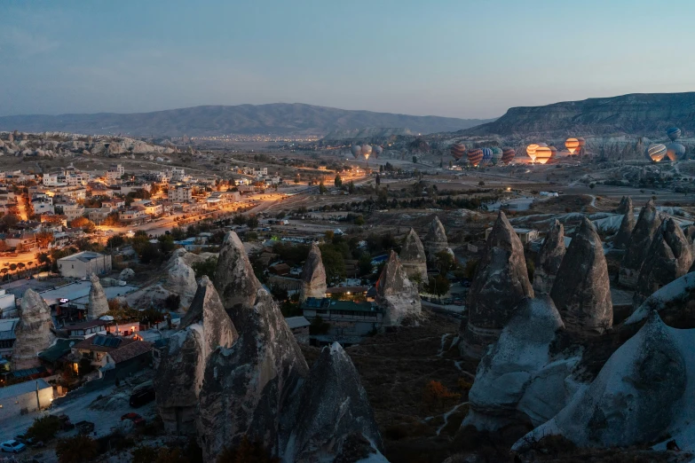 a city nestled between some mountains and the ocean