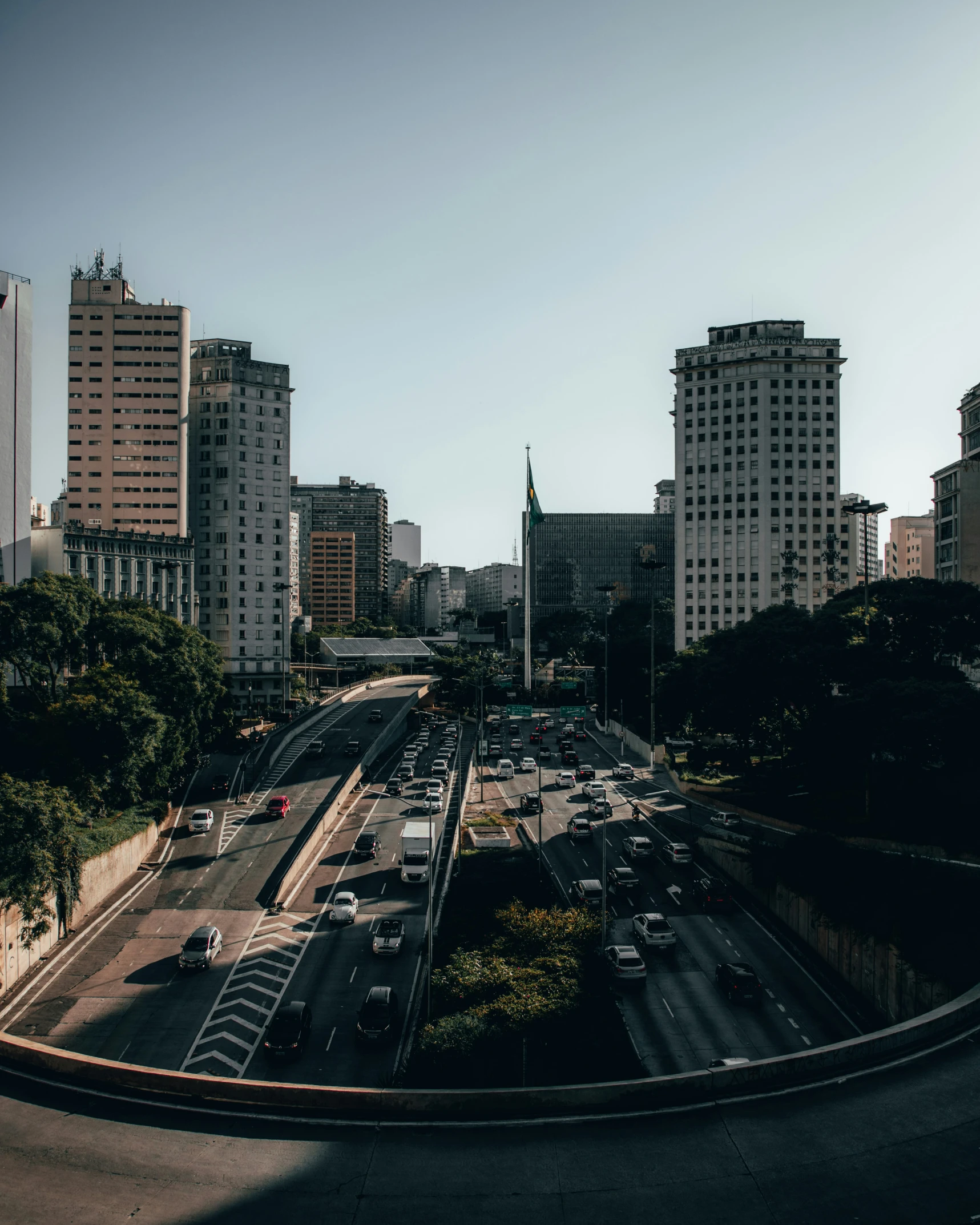 cityscape with some traffic on it and buildings in the background