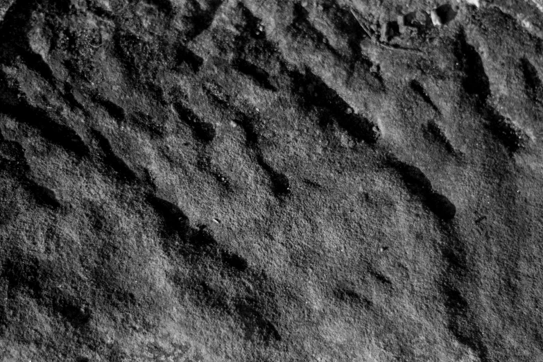 a close - up of a rocky landscape with vertical horizontal layers