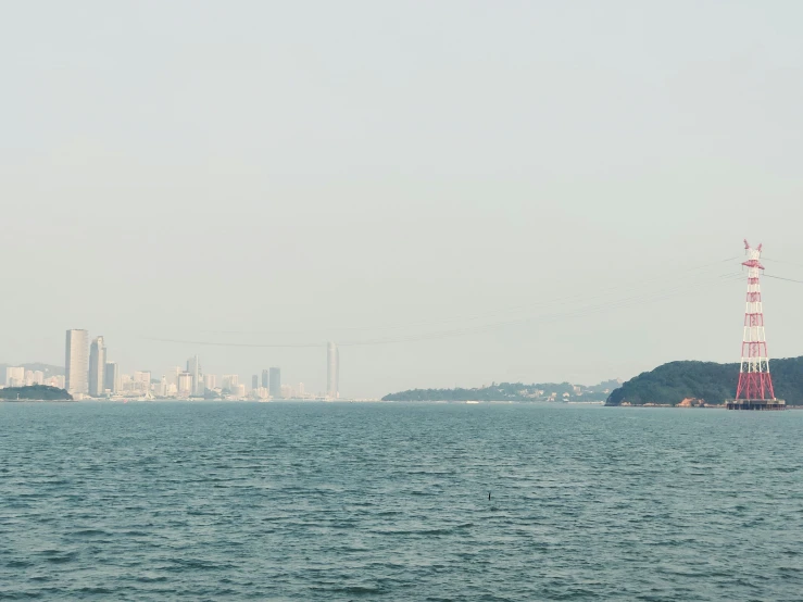 a lone boat is sailing through the ocean