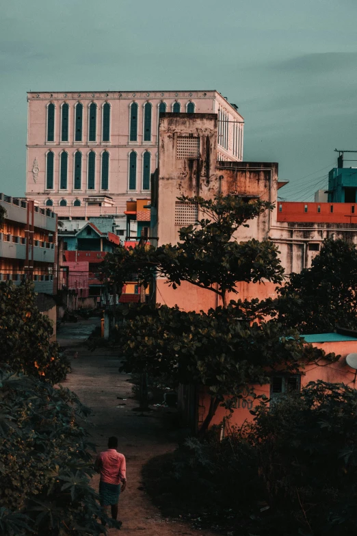 the building is next to a walking path