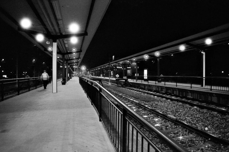 a train station is shown with its lights on