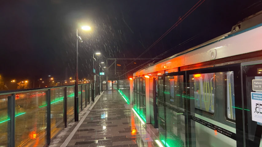 a bus stopped at an empty bus stop