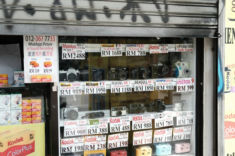 a store with signs and various items on the display