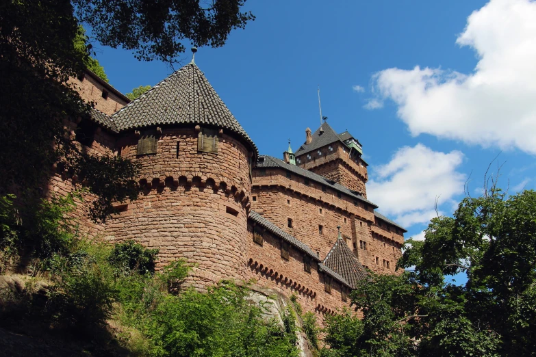 an old brick castle with towers and turrets