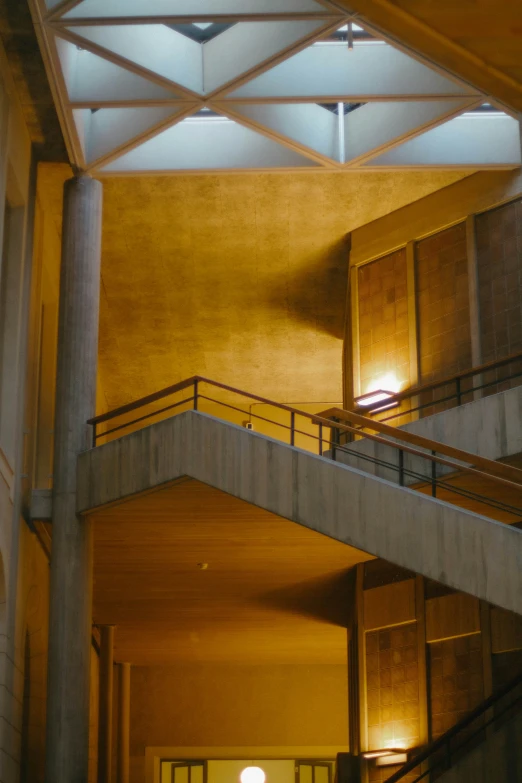 a view from the bottom of the staircase in the building