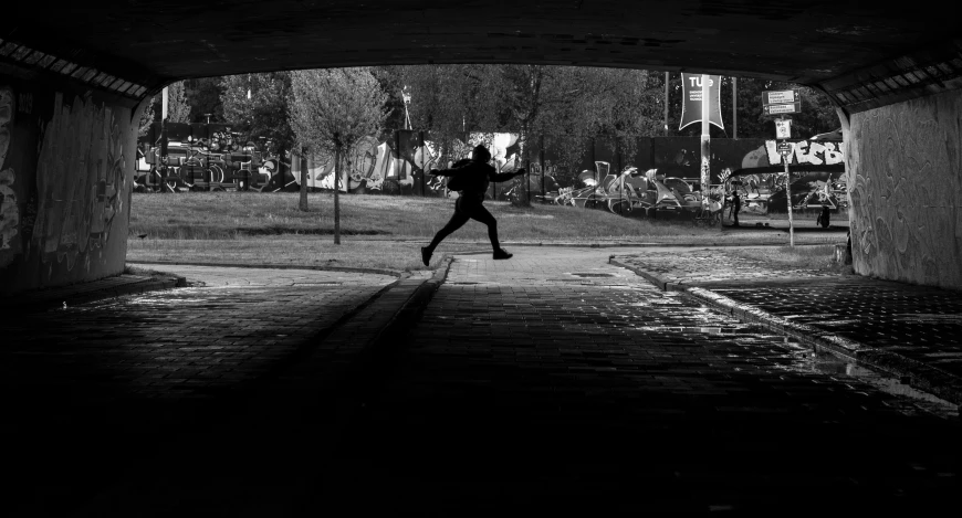 a man that is standing in the street