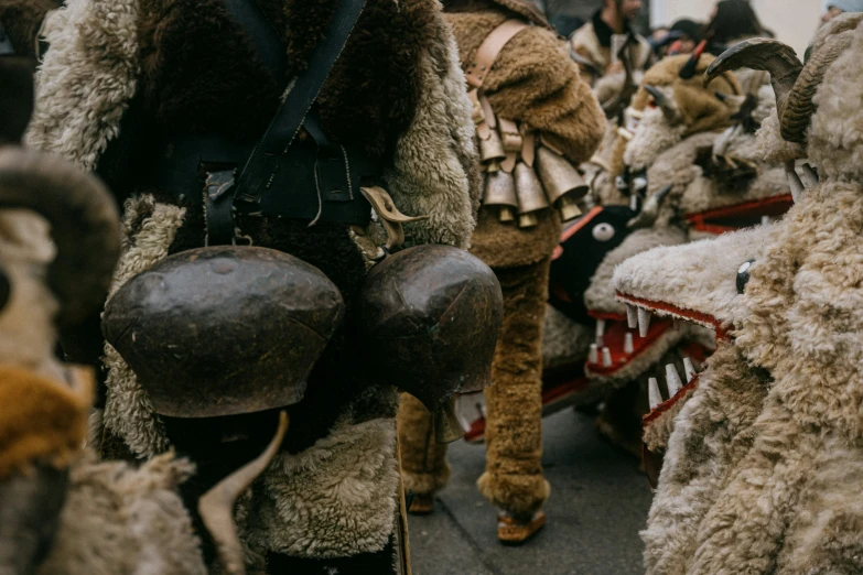 a man on horseback dressed in furry costumes