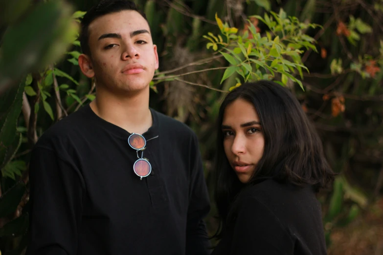 a man and a woman posing for a picture