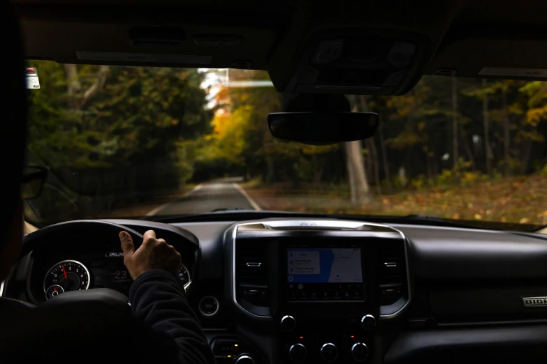 the view of the front and rear windshield from the passenger seat of a vehicle