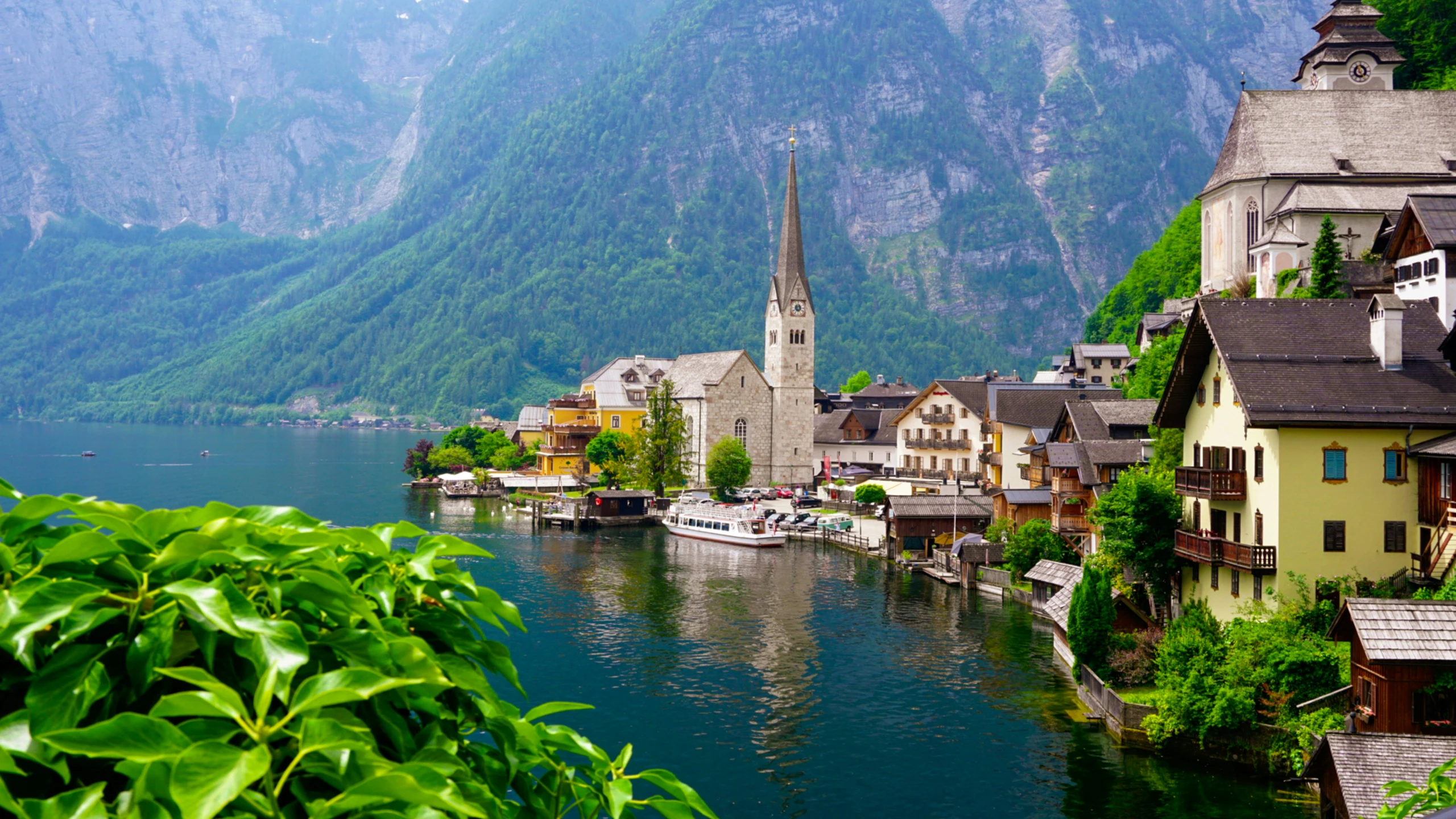 scenic small town on a narrow lake surrounded by mountains