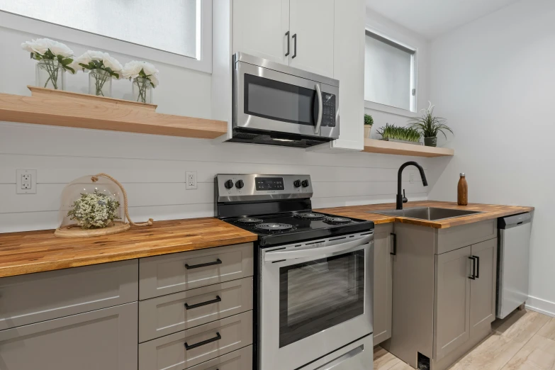 the counter tops and cabinets are wood grain