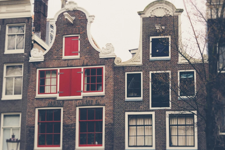 a house in the old european region with red windows