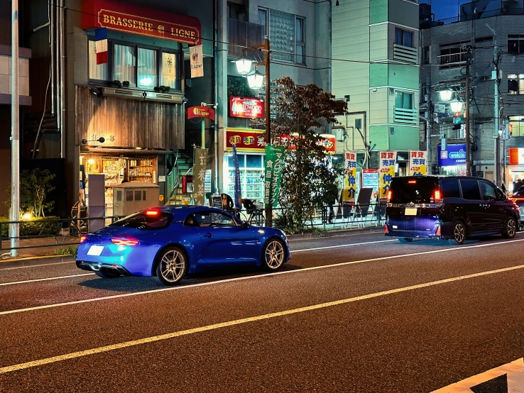 a car that is parked in front of a building