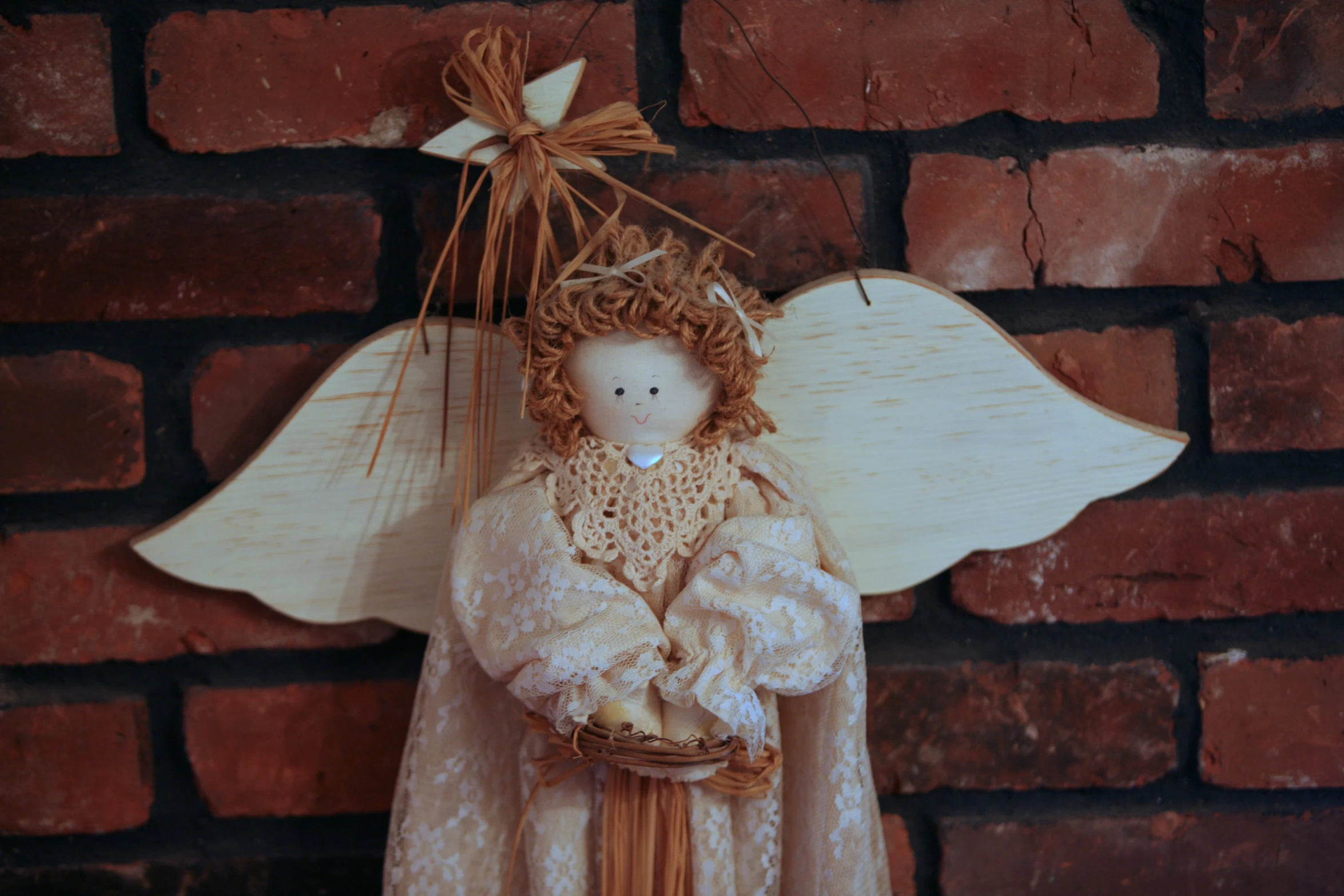 a small white angel is posed for a po