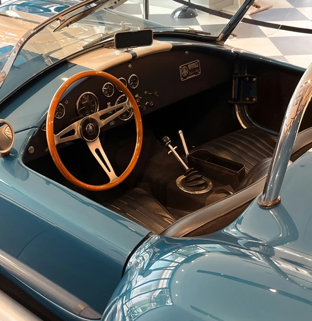 an old classic sports car with an interior