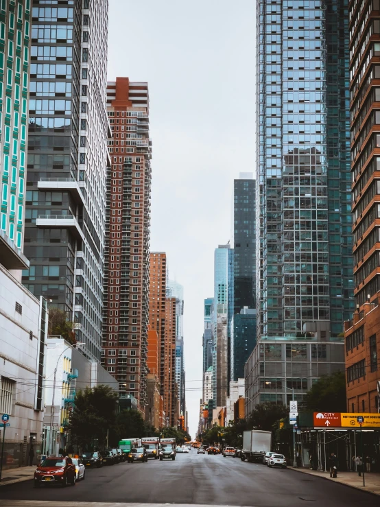 a street with several tall buildings in the background