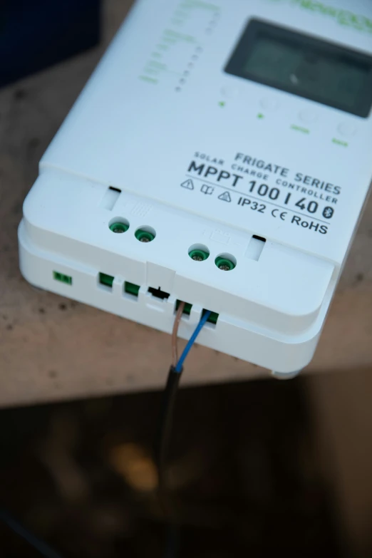 a close up of a route controller on a surface