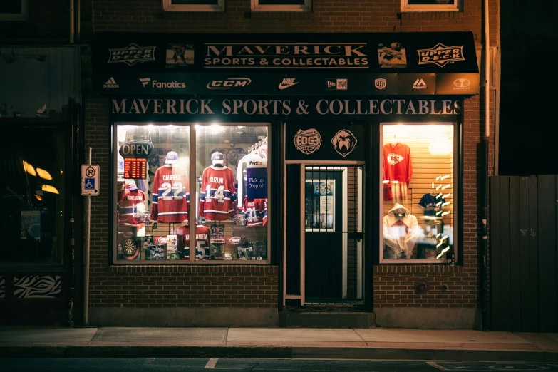 the front of a sports shop in the dark