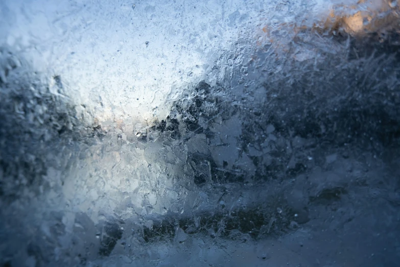 rain drops on the window and light in background