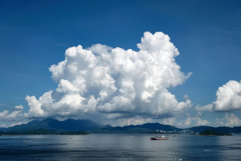 a picture of a cloudy blue sky that appears to be filled with a lot of clouds