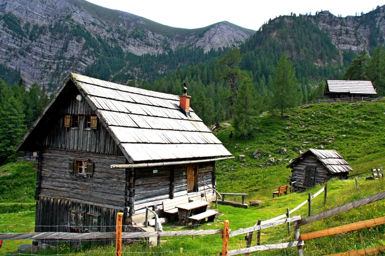 there are three barns on the hill