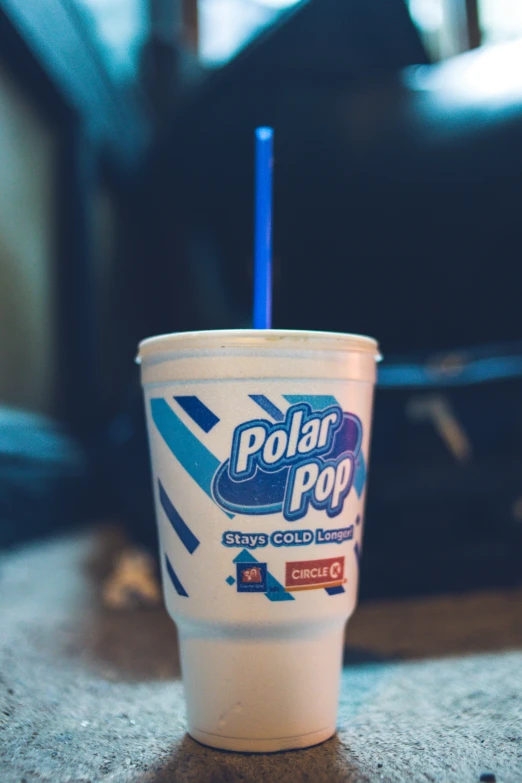 an ice cream drink sitting on top of a table