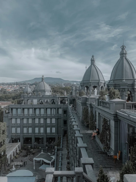 a group of buildings next to each other with sky in the background