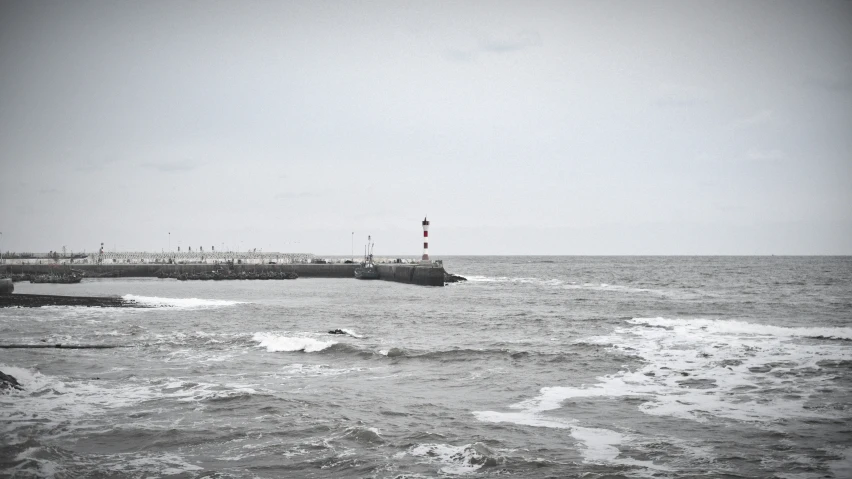 the small boat is traveling along the water