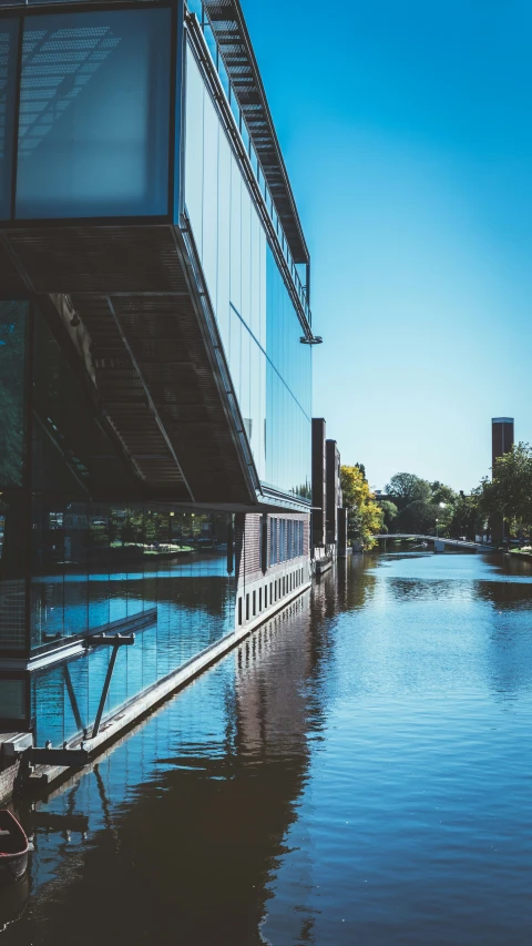 a long body of water with buildings in the distance