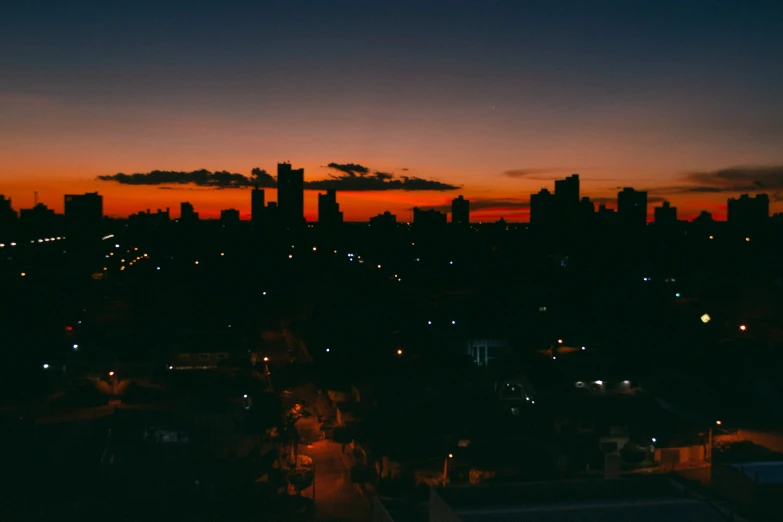 a view of the city skyline at night from atop