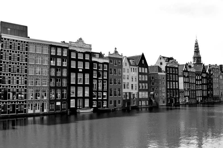 several buildings along a waterway in the city