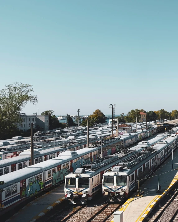 there is a train yard with many trains